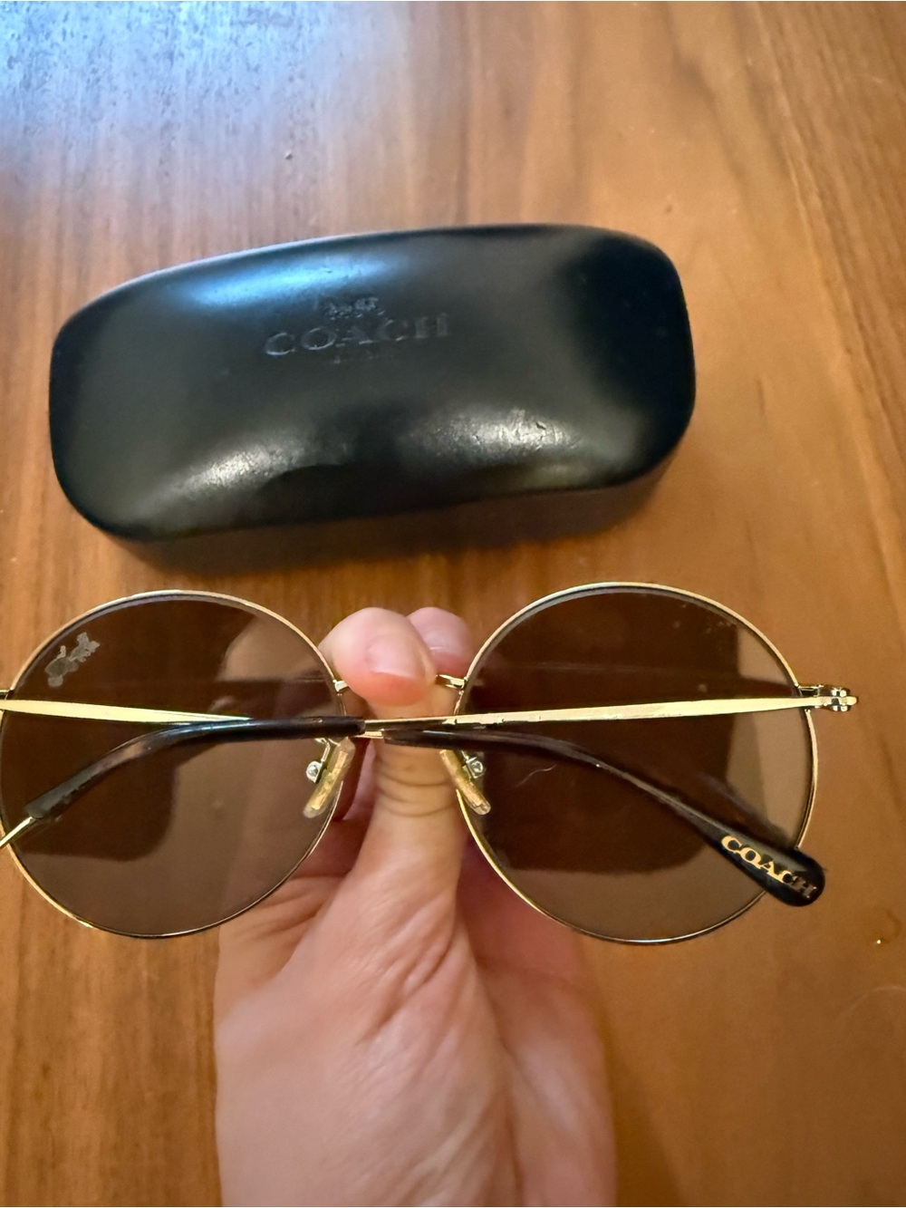 COACH Women's Round Gold Frame Sunglasses with Brown Lenses